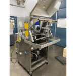 Klikok Jr folding machine with top open.