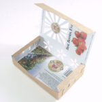 Low profile pt container on sale folded with printing inside.