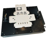 Kliklok paper container ready for folding in registration pegs.